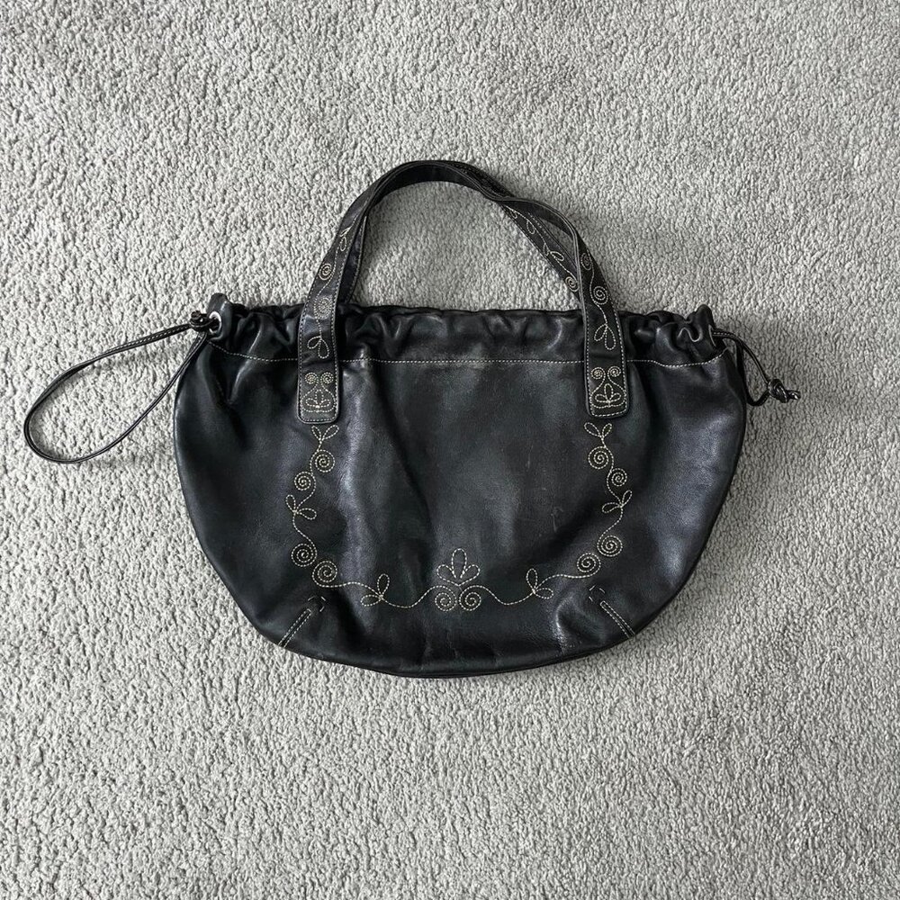 Black/brown leather bag with embroidery